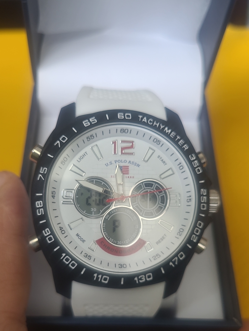 U.S. Polo Assn. White Dial Sport Watch with Black Tachymeter and Red Accents